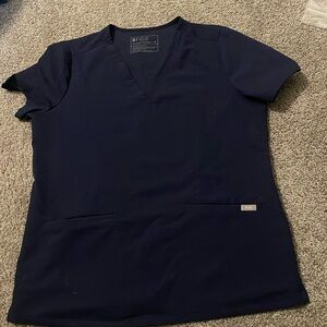 Navy blue two pocket fig scrub top